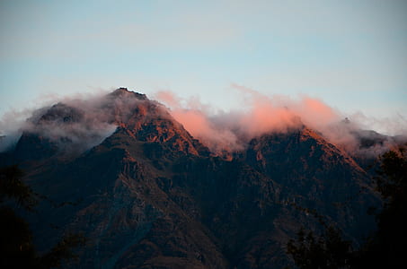 aerial photography of mountain covered with fog thumbnail