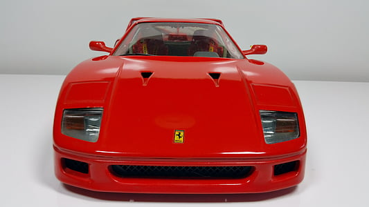 red Ferrari sports coupe thumbnail