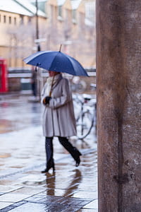 woman walking on gray floor thumbnail