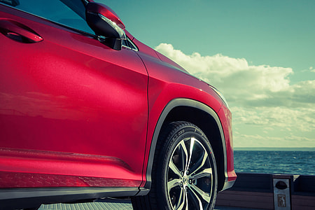 Red car on the coast thumbnail