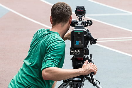 man using camcorder outdoors thumbnail
