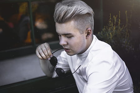 Man Sitting Near Window thumbnail