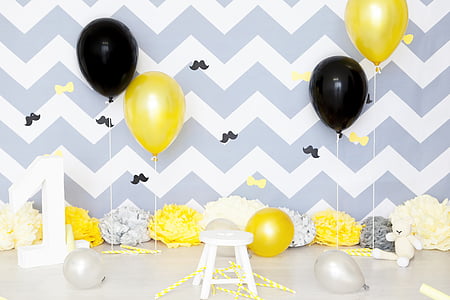 white-and-gray chevron wall with assorted-color balloon photo booth thumbnail