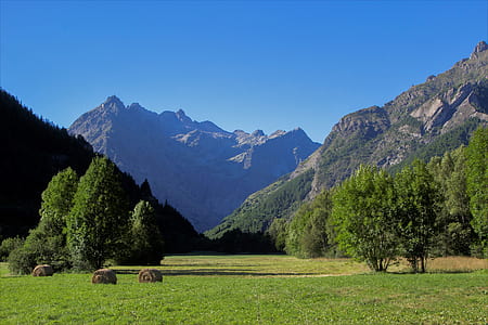 wide angle photography of mountain terrain thumbnail