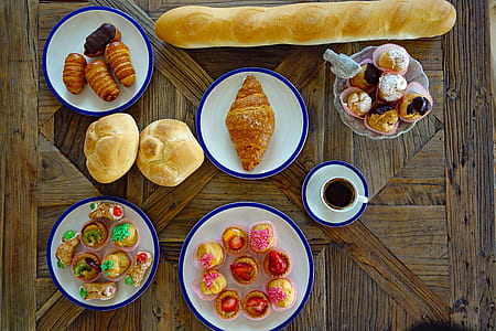 several breads on plates thumbnail