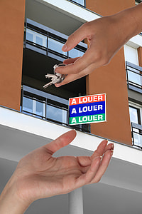 person's about to give bunch of keys to another person's hand thumbnail