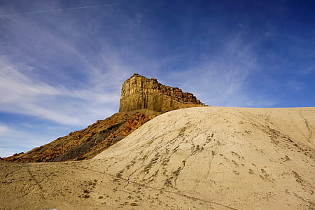 rock mountain over gray sand thumbnail