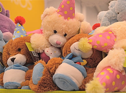 close-up photography of assorted-color bear plush toys thumbnail