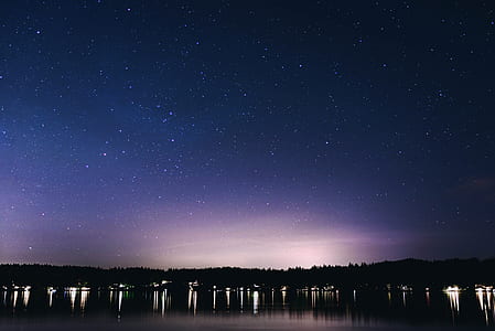 body of water during night time thumbnail