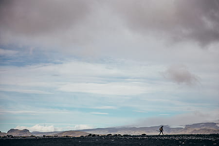 Photographer Hiking Iceland Flats Photo thumbnail