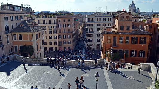 people on roof top near buildings thumbnail