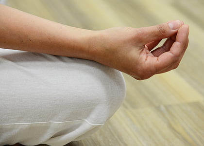 person wearing white bottoms meditating thumbnail