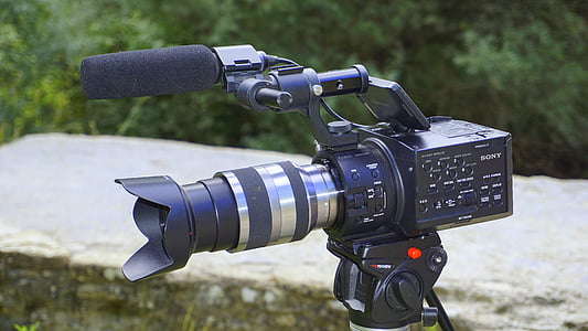 black and gray video camera with stand thumbnail