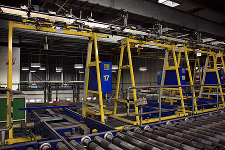 three rectangular yellow metal machines thumbnail