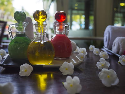 three yellow, red, and green cruets in tray thumbnail
