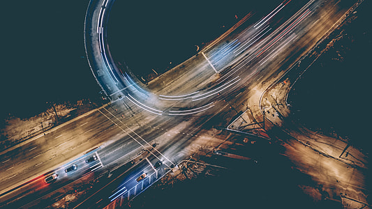 time lapse photo of asphalt road with cars thumbnail