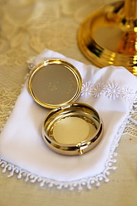 round gold-colored case thumbnail
