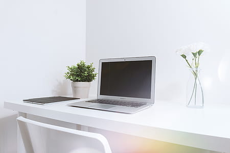 Modern white office interior with laptop thumbnail