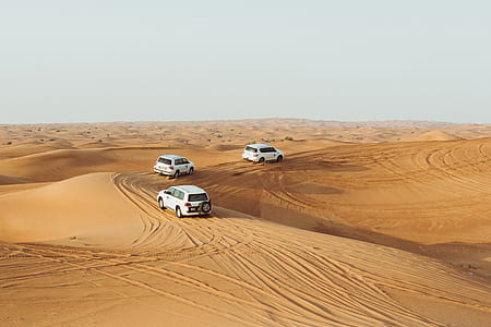 three SUV's traveling on the desert thumbnail