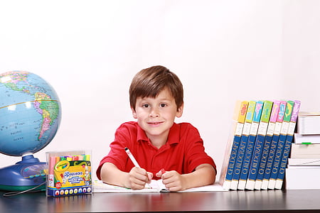 boy holding pen thumbnail