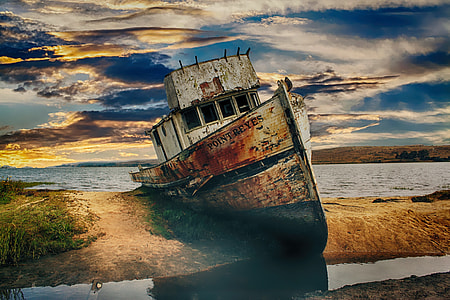 Point Reyes sail boat stranded on an Island during sunset photography thumbnail