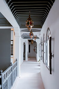 assorted-color pendant lamps in hallway thumbnail