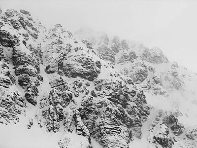 snow covered cliff during winter thumbnail