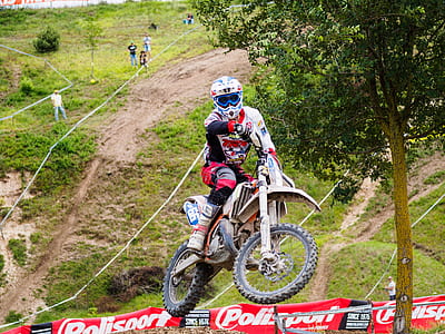 man riding on motocross dirt bike thumbnail