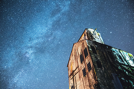Building and stars in the night sky thumbnail