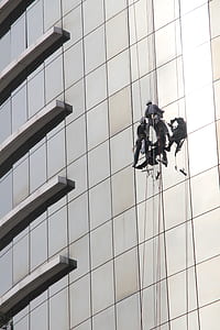 two man hanging beside building thumbnail