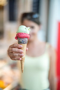 Shallow Focus of Ice Cream on Cone Photo thumbnail