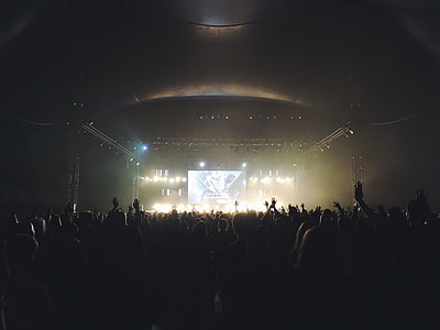 people standing near stage thumbnail