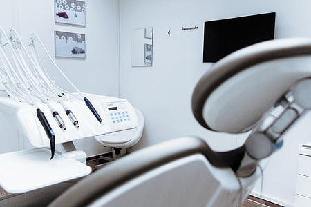 white medical chair inside room thumbnail