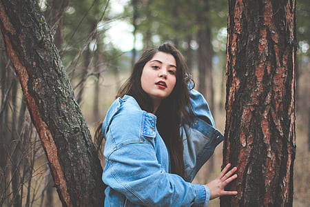 woman wearing blue denim jacket thumbnail
