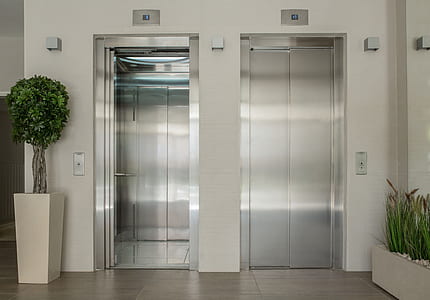 two grey elevators thumbnail