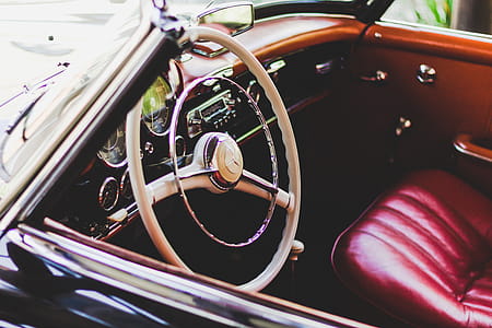 Photography of Red Leather Vehicle Interior thumbnail