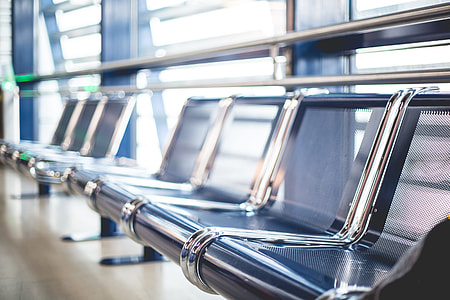 Empty Airport Seats in Terminal Waiting Area thumbnail
