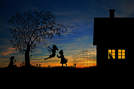 silhouette of three girls playing outside at sunset thumbnail