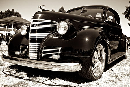 greyscale photography of black classic coupe thumbnail