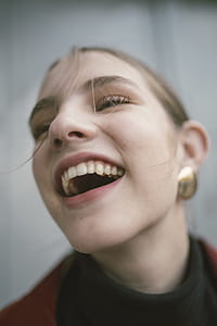 Close-Up Photography of a Laughing Woman thumbnail