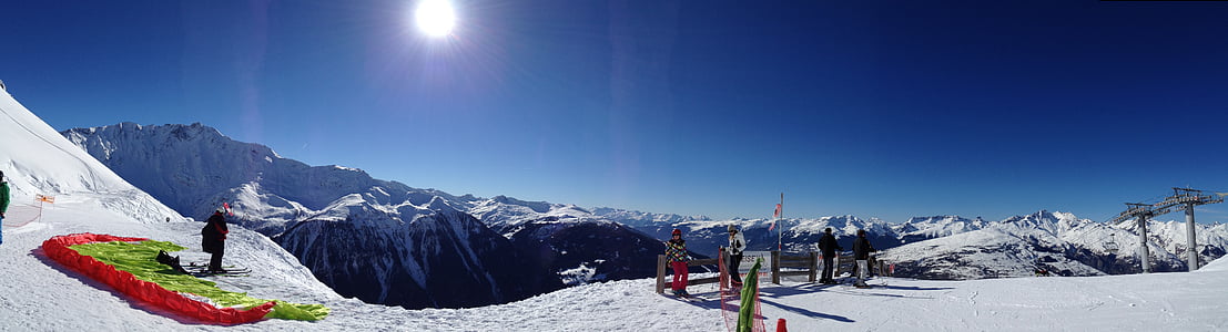 landscape photography of person's standing on snow surface thumbnail