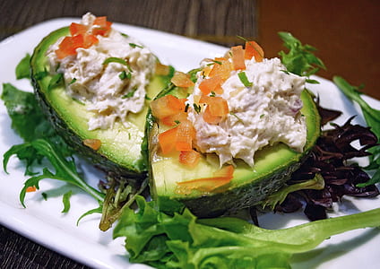 avocado salad on white plate thumbnail