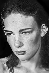 grayscale photo of woman thumbnail