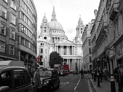 selective color focus photography of double decker bus and U.K. flag thumbnail