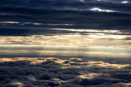 bird's eye view of clouds and crepuscular rays thumbnail