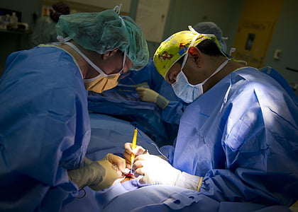 surgeons having medical operation inside operating room thumbnail