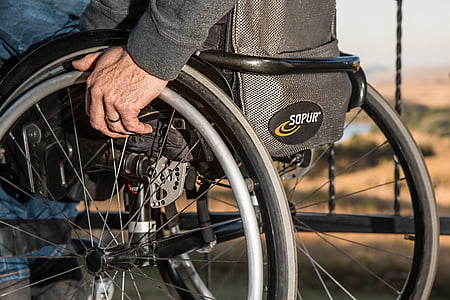 person on black wheelchair thumbnail