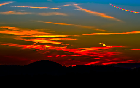 silhouette of mountain under golden hour thumbnail