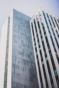 low angle photo of white high-rise building thumbnail