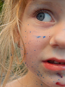 girl with paint in face thumbnail